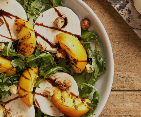 Grilled Peaches with Fresh Mozzarella & Candied Hazelnuts - Galbani Cheese